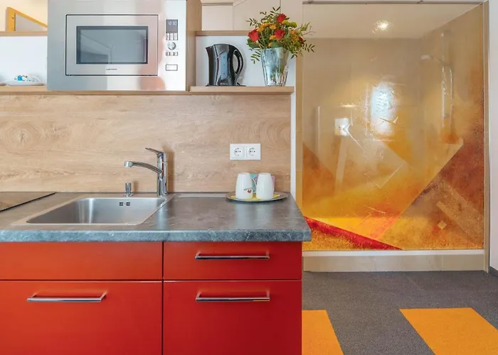 Отель Altoetting City Apartments Альтёттинг